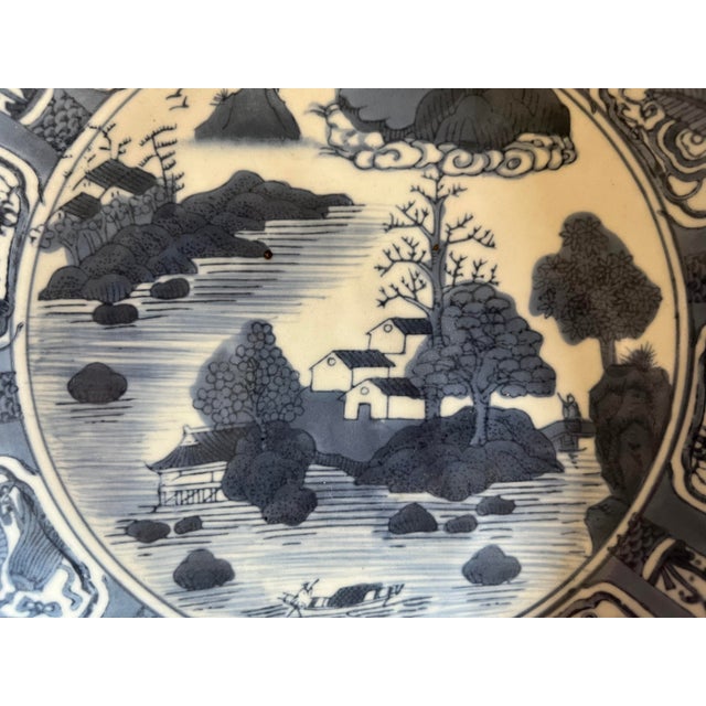 Chinese Kraak Ware style blue and white decorated with foliate and geometric designs, meandering vines underneath,...