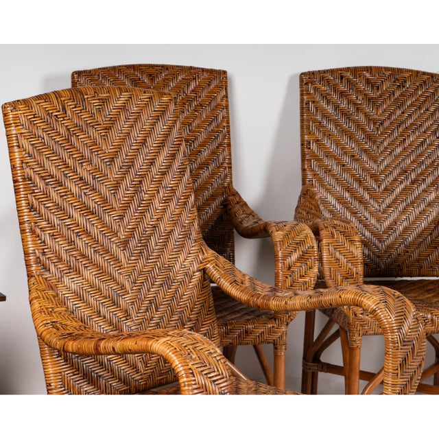 A Set of Four Wicker and Rattan Armchairs contemporary Unmarked Dimensions: 44 1/4 x 27 3/4 x 21 in. (112.4 x 70.5 x 53.3...