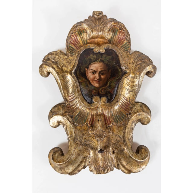 Charming, early 19th century, hand carved, gessoed, and 22-karat gold gilded, polychrome wall plaques featuring nature...