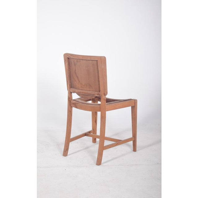 Dining chair with cut-out back. with its simple lines and functionalist design, it harks back to the modern style of the...