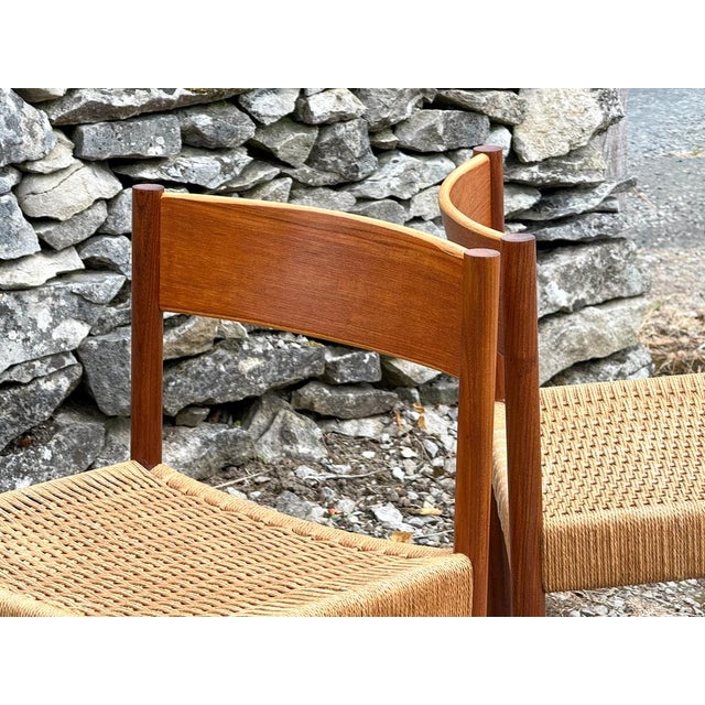Discover a stunning set of six chairs designed by Poul Volther in Denmark during the 1960s. Expertly restored, their...