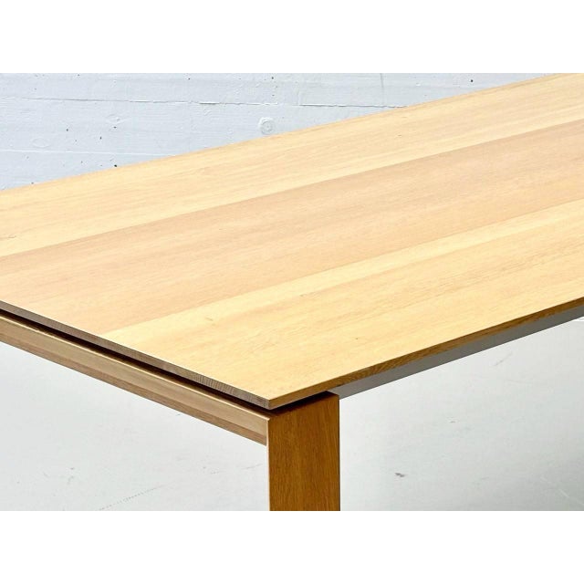 The furniture shown is a high-quality dining table from the dine@home series by the swiss manufacturer seetal swiss. the...