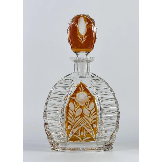 A striking early 20th-century crystal liqueur set comprising a substantial decanter with its original-style fitted stopper...