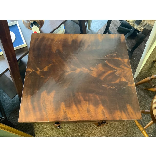 American Empire mahogany side table, circa 1840. Pedestal base, two drawers with pulls. Needs restoration.