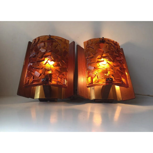 This pair of sconces was designed and produced by Vitrika in Denmark during the 1960s. They are made from brass-alloyed...