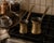 A charming vintage pair of Lebanese brass Turkish / Arabic coffee pots (cezves / ibriks), marked Made in Lebanon and...