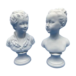 1930s Large Pair of Limoges Bisque Busts, Featuring the Brongniart Children Based on the Terracotta Busts by Jean-Antoine Houdon