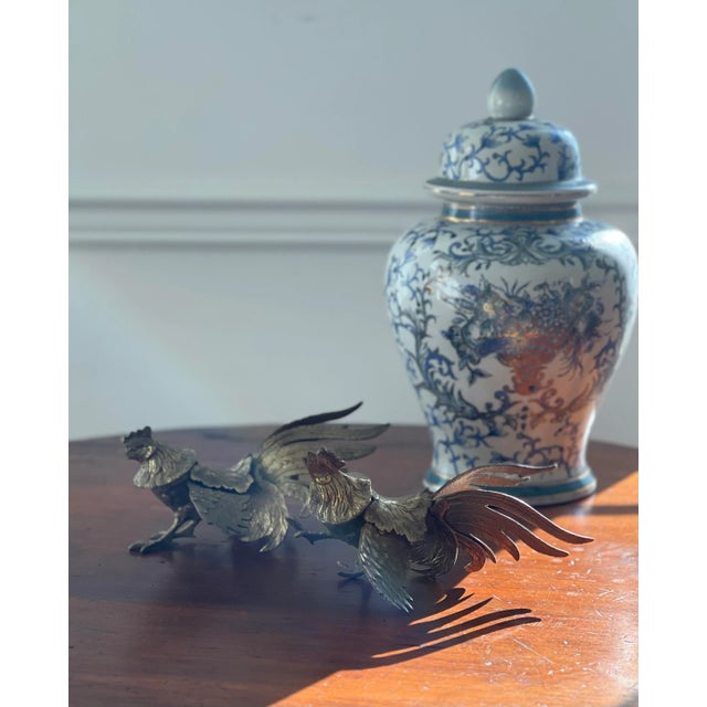 Add texture and patina to a space with this pair of brass fighting roosters. Their timeless style works in most any...