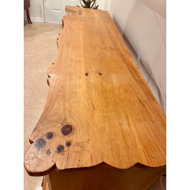 One of a kind antique solid soft pine dresser with brass handles. Solid round feet and whimsical scalloped edge details...