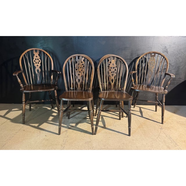 Set of 6 (4x2) English Wheel Back Windsor Dining or Kitchen Chairs, mid century in date made by JC label underneath. In...