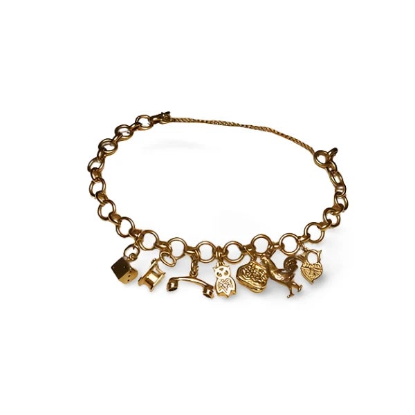 Timeless Estate 14K Pink Gold Charm Bracelet featuring seven intricately crafted pink gold charms . This 7.5-inch bracelet...