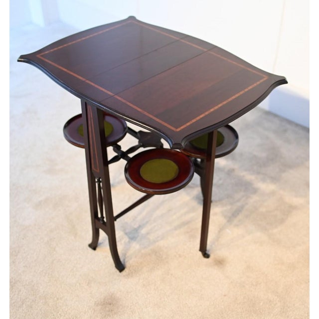 Quirky edwardian antique cake or serving table table features four pull up round stands for the cakes we date this to 1900...
