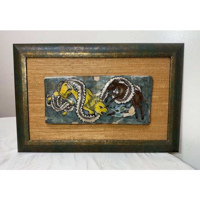 This antique hand-painted 19th century Middle Eastern pottery wall tile is a unique and authentic piece of decorative...