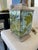 Pair of charming lamp bases with stylish floral decorations on mercury glass. Colors are sophisticated with soft color...