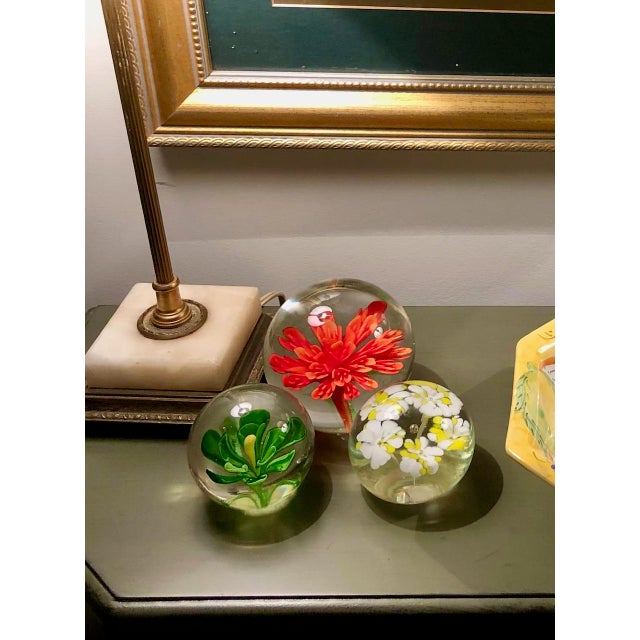 This vintage Yellow And White Floral Paperweight is a unique and cheery option with its yellow and white flowers...