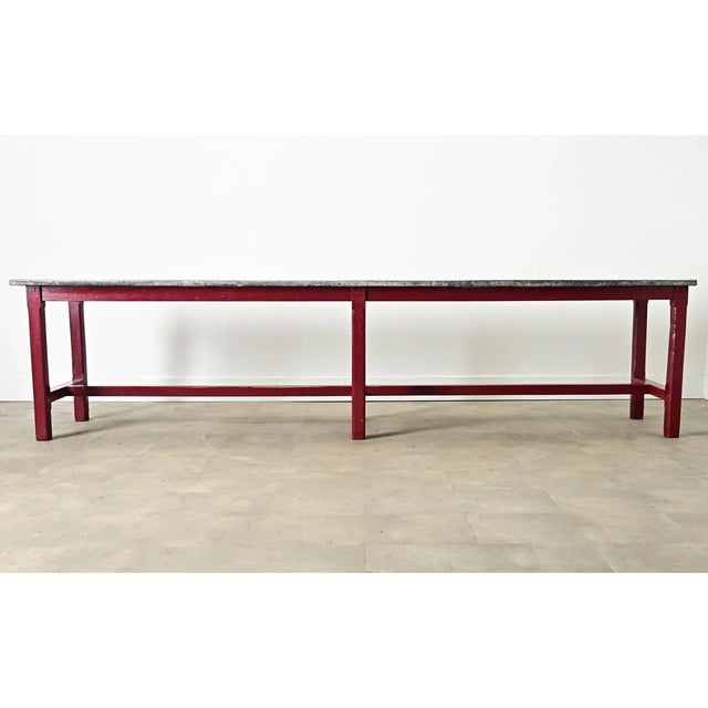 Dimensions: 28” H x 117” W x 28” D A vintage farm table from early-to-mid 20th century France, nearly ten feet long to...