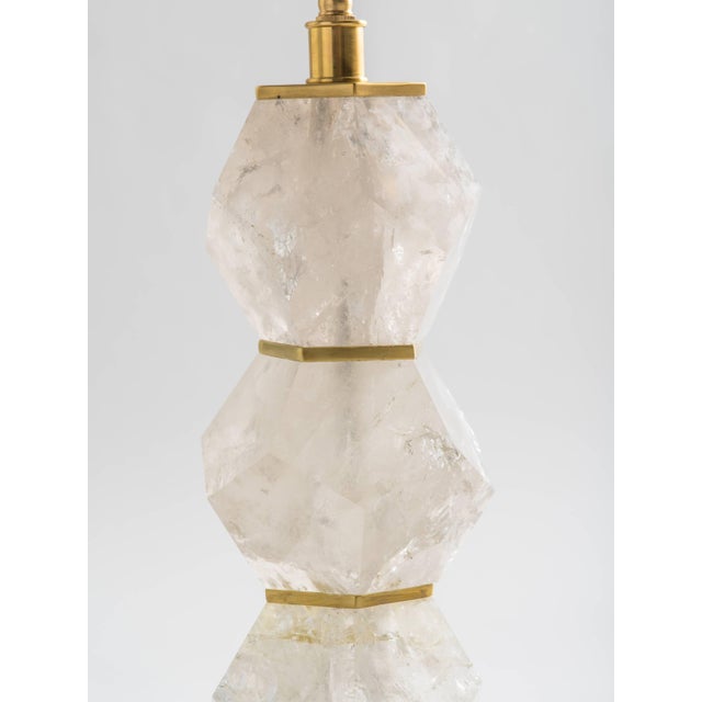Eon collection, "Lustrum" Classic handcrafted rock crystal quartz lamps composed of pentagonal elements. Signed by the...