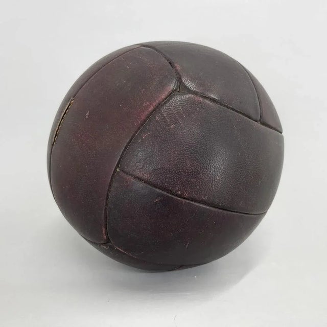 Original vintage heavy leather training ball with beautiful patina. The ball is made of handstitched genuine leather in...