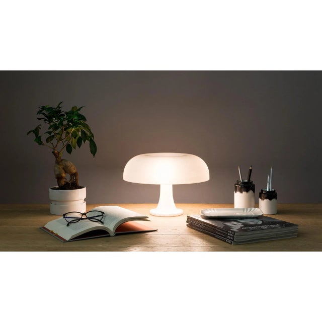 Nessino' Table Lamp by Giancarlo Mattioli for Artemide in White. This lamp has become a design icon, with its mushroom...