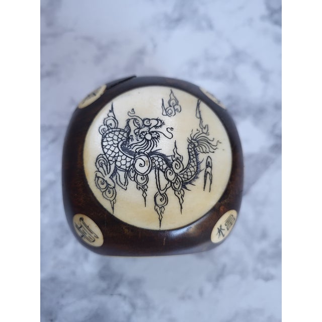 Chinese zodiac cube made with rosewood and inlaid bone. Dating back to 1920s with beautifully detailed scrimshaw artistry...