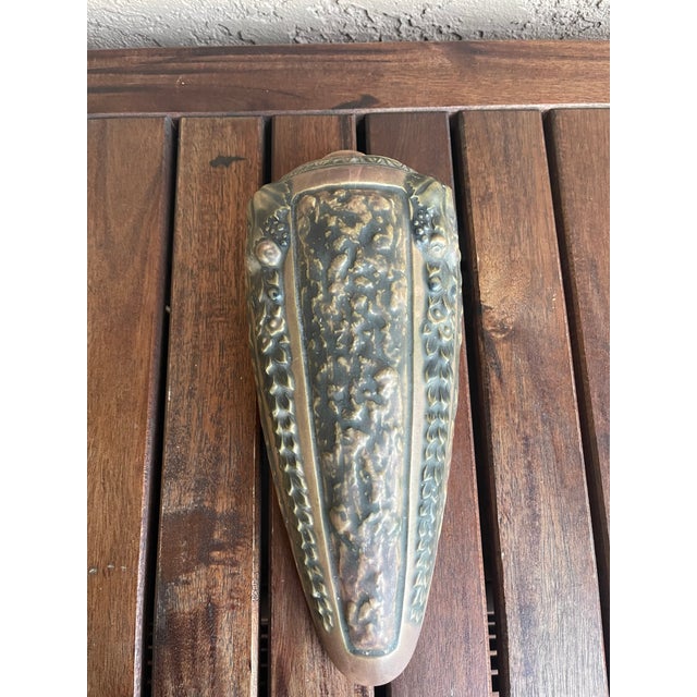 This is a vintage Roseville Pottery Florentine wall pocket, introduced around 1924. I purchased this piece at least 18...