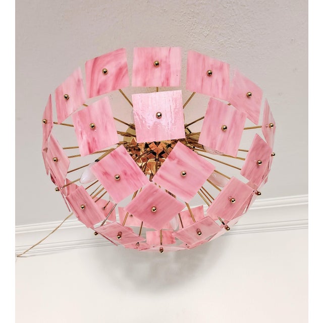 Delicately crafted with vitray-style stained glass panels, each pink tile diffuses the light with a warm, romantic...