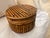 Beautiful vintage nesting boxes crafted from natural bamboo, featuring intricate hand-wrapped detailing and a wonderfully...