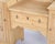 Dressing table made of pine in Denmark around the 1920s. The piece features a mirror and tabletop space for storage and...