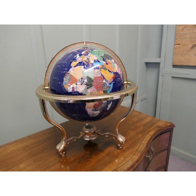 Table Top World Globe in Lapis and Brass Elegant Pietra Dura World Globe in Lapis enamel and Brass finish with coloured...