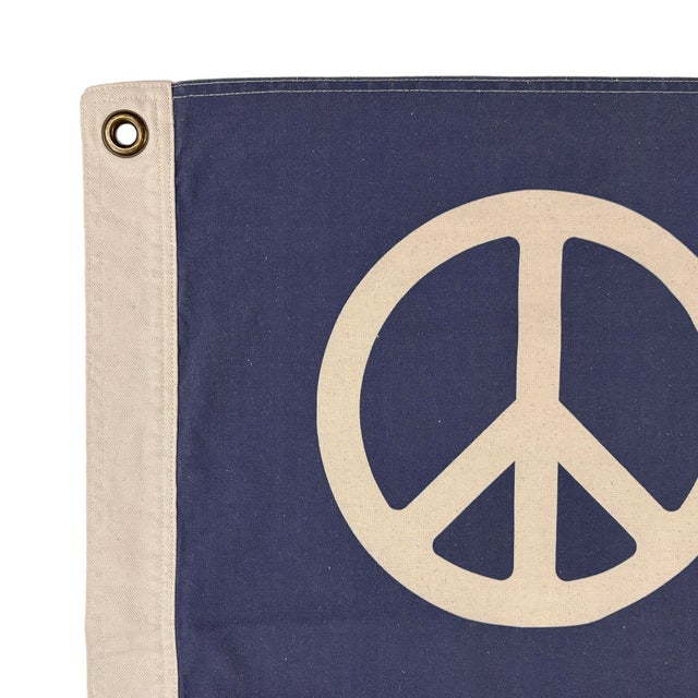 This decorative American Peace Sign flag is made from 100% cotton canvas in off-white and faded colors. Design is printed...