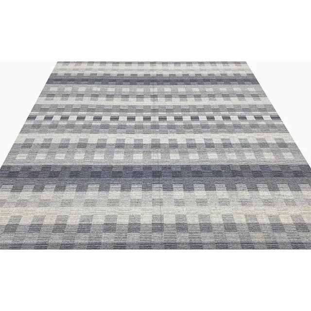 This fun rug is a beautiful flatweave Kilim area rug. The lightweight construction makes this tribal rug an excellent...