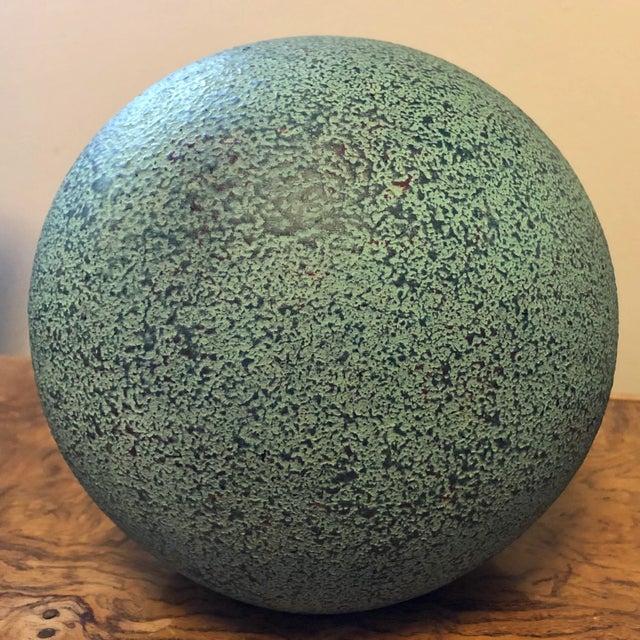 Unusual 1980's textured verdigris pottery sphere by Jaru. Original label underneath.