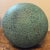 Unusual 1980's textured verdigris pottery sphere by Jaru. Original label underneath.