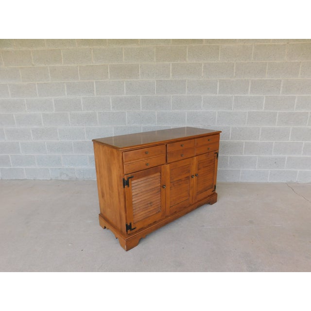 Ethan Allen Heirloom Nutmeg Credenza Buffet Chest 10-6017 2 Dovetailed drawers. Approx 40 years old. Bi-Fold lower...