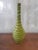 Beautiful green and white cold-painted thin neck vase, made in Spain.