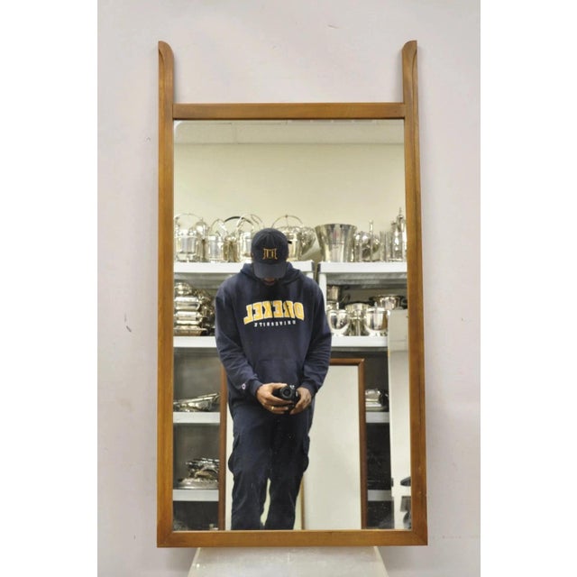 Vintage Mid Century Modern Sculpted Walnut Finial Modernist Wall Mirror. Circa Mid 20th Century. Measurements: 46" H x 24"...