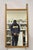 Vintage Mid Century Modern Sculpted Walnut Finial Modernist Wall Mirror. Circa Mid 20th Century. Measurements: 46" H x 24"...