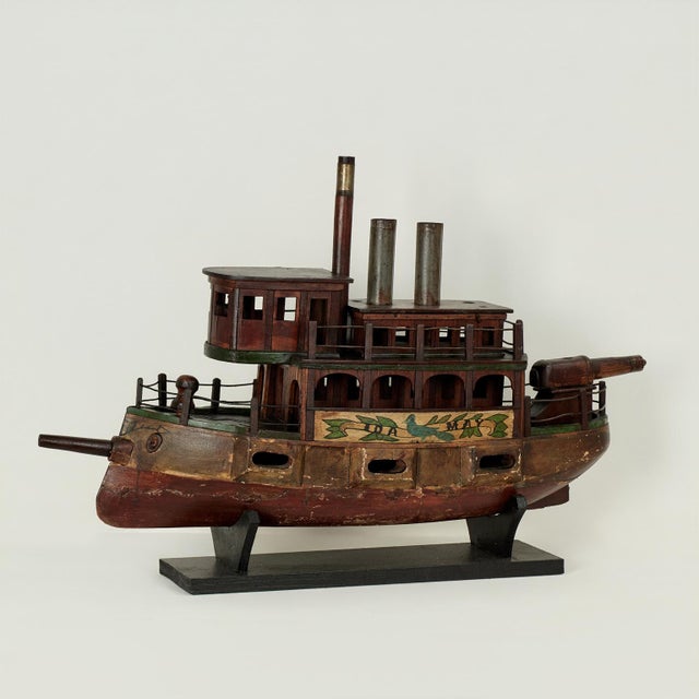 Whimsical 19th century one of a kind folk art boat model crafted in hardwoods and found objects, retaining the original...