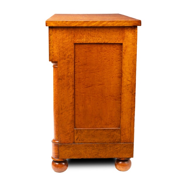 An American Neoclassic chest of drawers in bird's-eye maple, made in Philadelphia or Baltimore in the French Restoration...