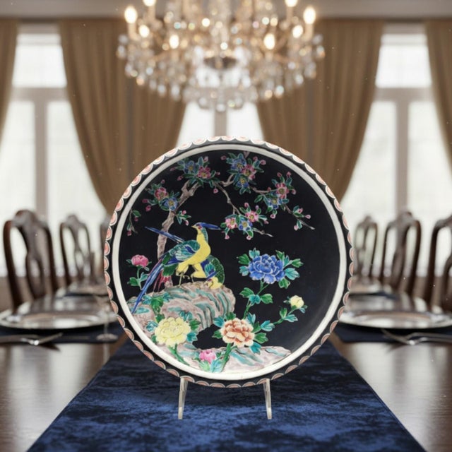 This vintage Nippon-style bowl reflects a late-20th-century reinterpretation of early Japanese export enamelware....