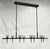 A striking example of contemporary American lighting design, this "Kellen" 8-Light Chandelier was designed and...