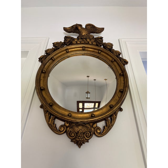 Stunning antique Federal style giltwood convex mirror. From a Seacoast, New Hampshire estate, it was purchased from a New...