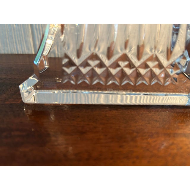 In breakfront for years. Just pulled battery tab to activate, works great. Acid etched Waterford stamp. The product is a...