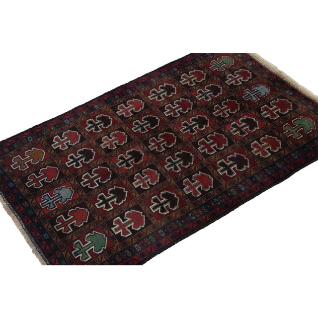 Hand knotted in wool, this 4x6 Baluch rug represents a new line of tribal carpets in the Modern Classics Collection by Rug...
