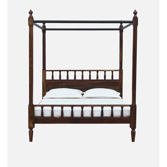 This handcrafted solid mango four poster bed exemplifies timeless colonial design and artisanal craftsmanship. Made in...