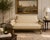 This striking vintage settee showcases an intricately carved rope-twist wooden frame, finished with refined gold leaf...
