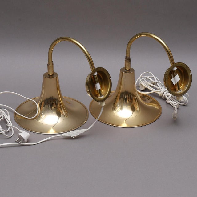 A remarkable and one-of-a-kind brass wall lights skillfully created by the acclaimed danish designer börje claes. While...