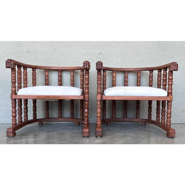 Recently restored pair of vintage walnut framed barrel back chairs with white upholstery Details Dimensions Height: 25.2...