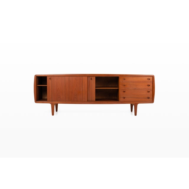 An elegant danish teak sideboard designed by hp hansen and produced by hp hansen møbelindustri in denmark during the...