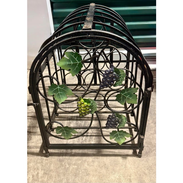 This wine rack is a staple in French Country or Tuscan-themed home decor. The 9-bottle capacity is optimized for standard...